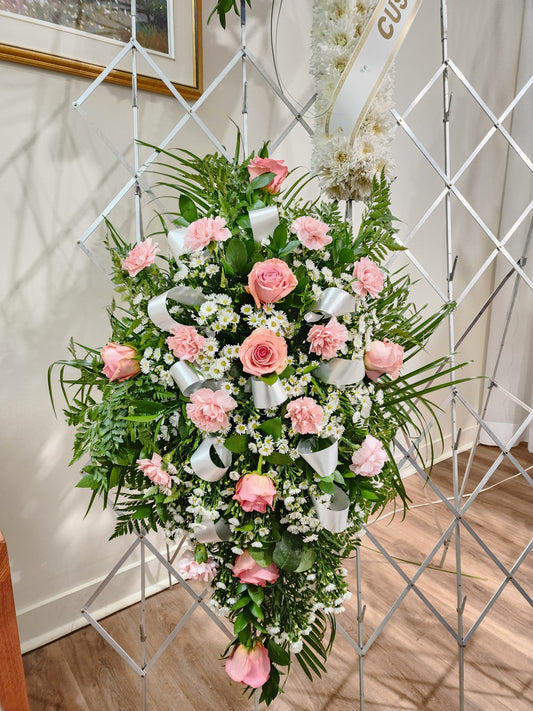 Cascade style funeral flowers
