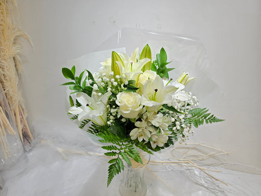 white flowers with vase