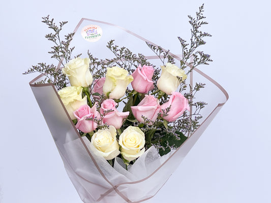 12 pink and white roses