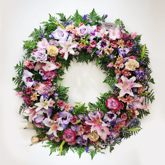 funeral flowers - purple and pink