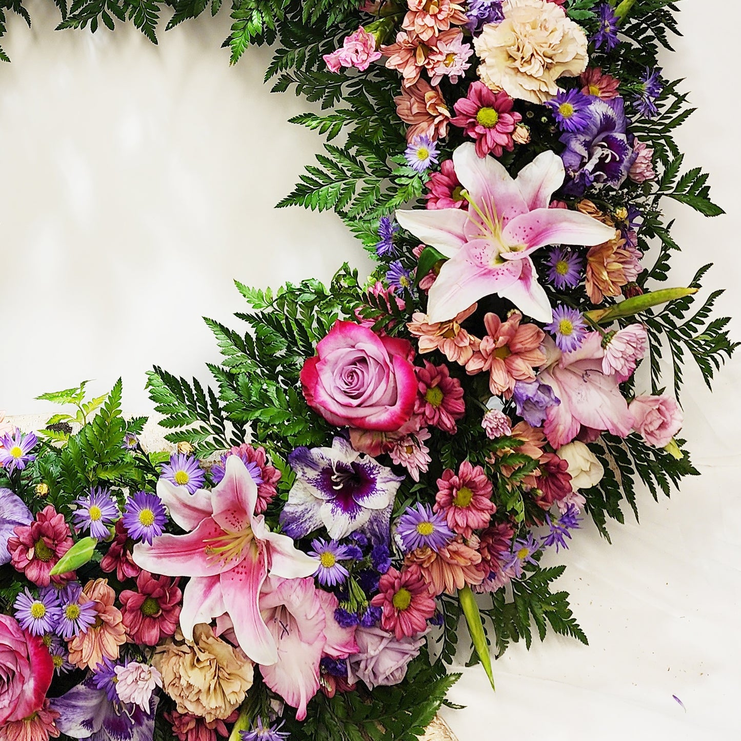 funeral flowers - purple and pink