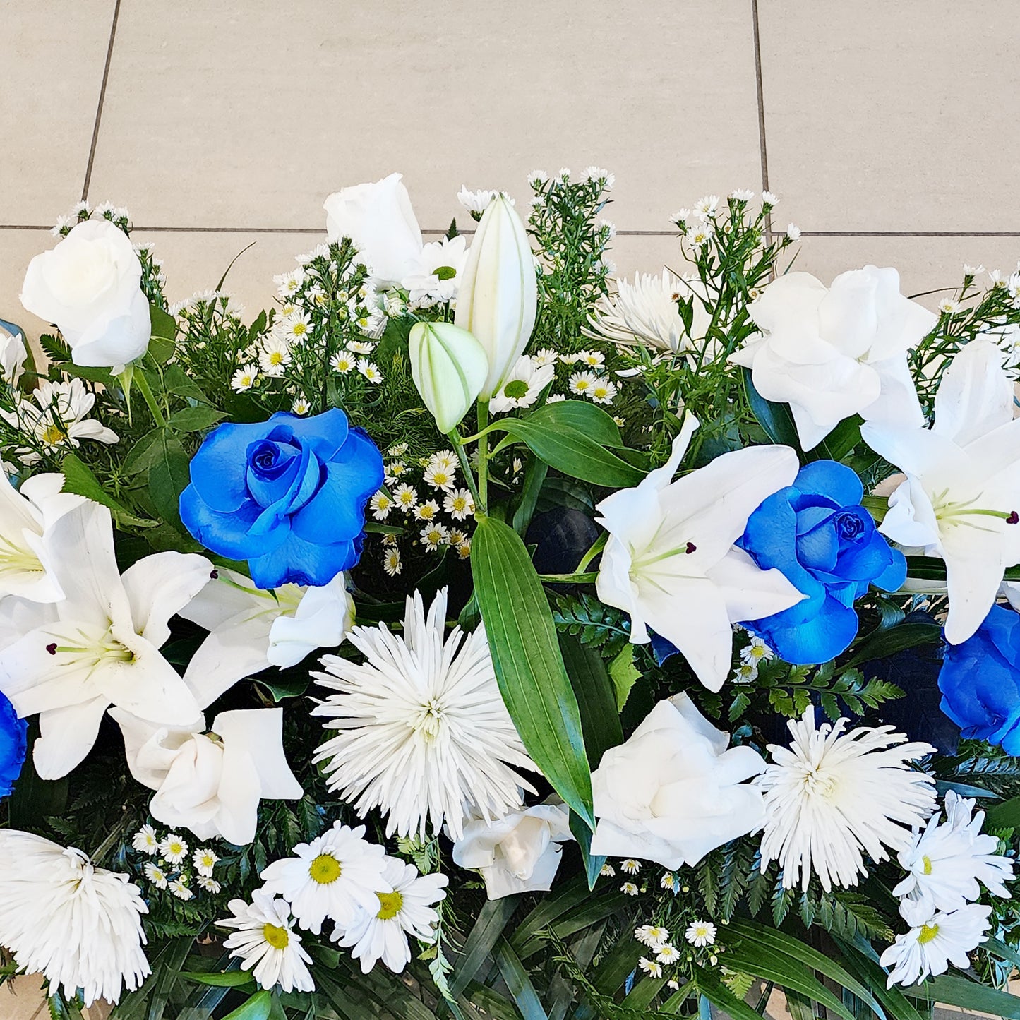 funeral flowers - White and Blue